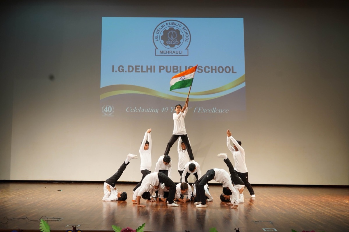 Students performing on stage at the I.G. Delhi Public School Annual Day